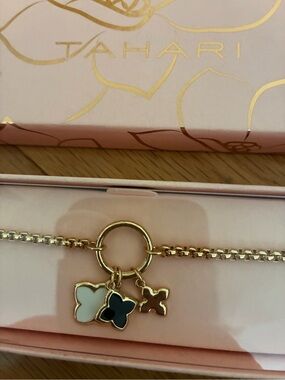 Tahari Gold-Tone Bracelet with 3 Clover Charms, Black, White and Gold. New